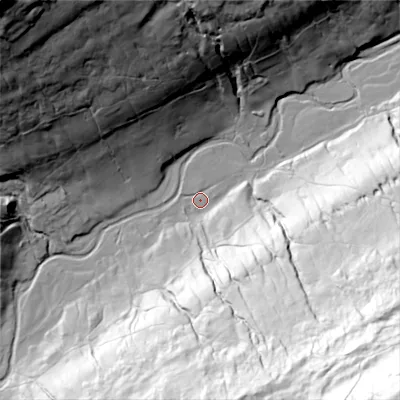 Shaded relief map of the ground around DL84LF, computed from Environment Agency LiDAR. The ground here sits at about 315 m above sea level and falls 188 m across the surrounding 800 m. Surface water reaching this point runs off ground lying to the south-south-east, 115.4 m higher.
