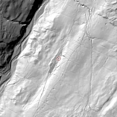 Shaded relief map of the ground around DL84LG, computed from Environment Agency LiDAR. The ground here sits at about 297 m above sea level and falls 192 m across the surrounding 800 m. Surface water reaching this point runs off ground lying to the south-east, 68.0 m higher.
