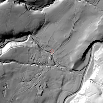 Shaded relief map of the ground around DL84TP, computed from Environment Agency LiDAR. The ground here sits at about 230 m above sea level and falls 79 m across the surrounding 800 m. Surface water reaching this point runs off ground lying to the north-west, 63.1 m higher.