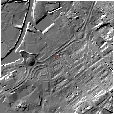 Shaded relief map of the ground around DN12QT, computed from Environment Agency LiDAR. The ground here sits at about 10 m above sea level and falls 15 m across the surrounding 800 m. Surface water reaching this point runs off ground lying to the east-south-east, 12.2 m higher.