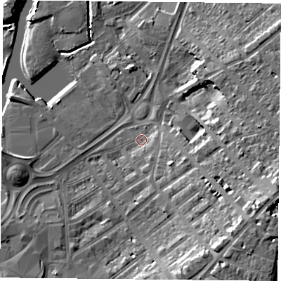 Shaded relief map of the ground around DN12QX, computed from Environment Agency LiDAR. The ground here sits at about 11 m above sea level and falls 16 m across the surrounding 800 m. Surface water reaching this point runs off ground lying to the east-south-east, 2.1 m higher.