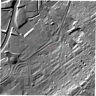 Shaded relief map of the ground around DN12RU, computed from Environment Agency LiDAR. The ground here sits at about 10 m above sea level and falls 15 m across the surrounding 800 m. Surface water reaching this point runs off ground lying to the south-east, 13.2 m higher.
