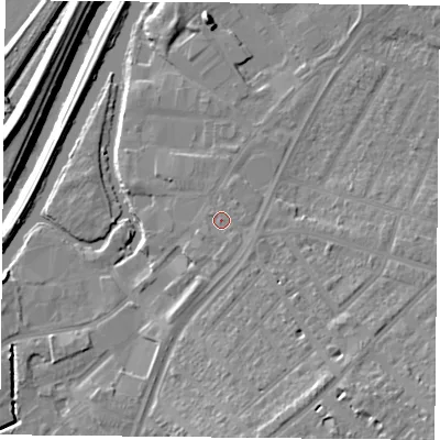 Shaded relief map of the ground around DN12TE, computed from Environment Agency LiDAR. The ground here sits at about 12 m above sea level and falls 16 m across the surrounding 800 m. Surface water reaching this point runs off ground lying to the south-east, 1.3 m higher.