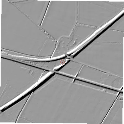 Shaded relief map of the ground around DN140AP, computed from Environment Agency LiDAR. The ground here sits at about 7 m above sea level and falls 9 m across the surrounding 800 m. Surface water reaching this point runs off ground lying to the south-west, 5.6 m higher.