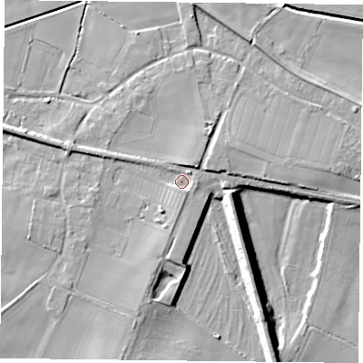 Shaded relief map of the ground around DN140AS, computed from Environment Agency LiDAR. The ground here sits at about 7 m above sea level and falls 12 m across the surrounding 800 m. Surface water reaching this point runs off ground lying to the south-south-east, 2.5 m higher.