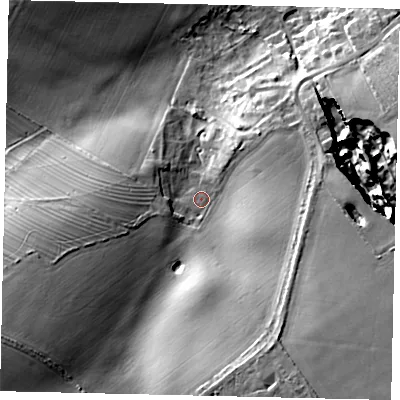 Shaded relief map of the ground around DN197DY, computed from Environment Agency LiDAR. The ground here sits at about 12 m above sea level and falls 17 m across the surrounding 800 m. Surface water reaching this point runs off ground lying to the south-south-east, 12.4 m higher.