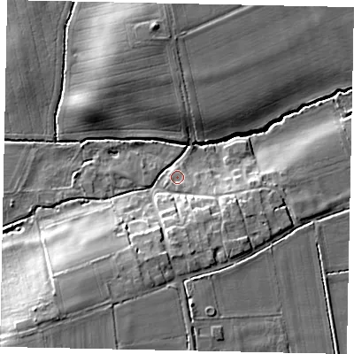 Shaded relief map of the ground around DN214TQ, computed from Environment Agency LiDAR. The ground here sits at about 11 m above sea level and falls 16 m across the surrounding 800 m. Surface water reaching this point runs off ground lying to the south-east, 2.7 m higher.