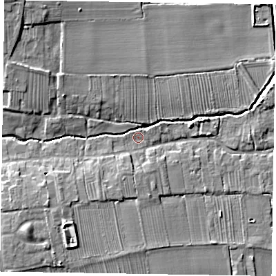 Shaded relief map of the ground around DN220AQ, computed from Environment Agency LiDAR. The ground here sits at about 9 m above sea level and falls 13 m across the surrounding 800 m. Surface water reaching this point runs off ground lying to the south-south-west, 4.6 m higher.