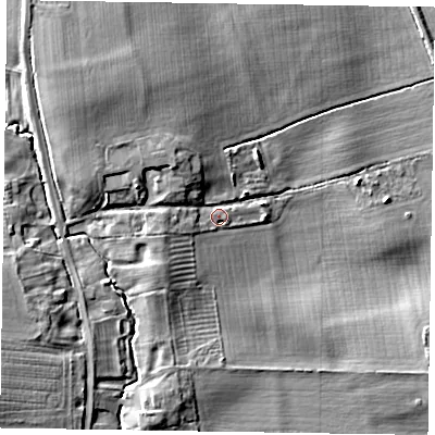 Shaded relief map of the ground around DN229ES, computed from Environment Agency LiDAR. The ground here sits at about 11 m above sea level and falls 14 m across the surrounding 800 m. Surface water reaching this point runs off ground lying to the north-west, 5.4 m higher.