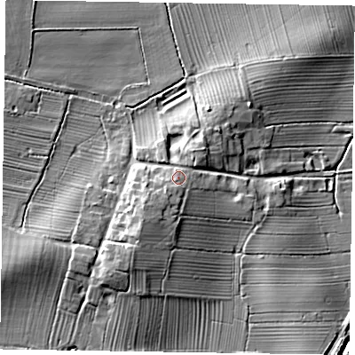 Shaded relief map of the ground around DN229EW, computed from Environment Agency LiDAR. The ground here sits at about 12 m above sea level and falls 11 m across the surrounding 800 m. Surface water reaching this point runs off ground lying to the south-west, 1.7 m higher.