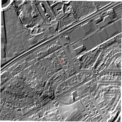 Shaded relief map of the ground around DN24HN, computed from Environment Agency LiDAR. The ground here sits at about 11 m above sea level and falls 14 m across the surrounding 800 m. Surface water reaching this point runs off ground lying to the south-east, 2.2 m higher.