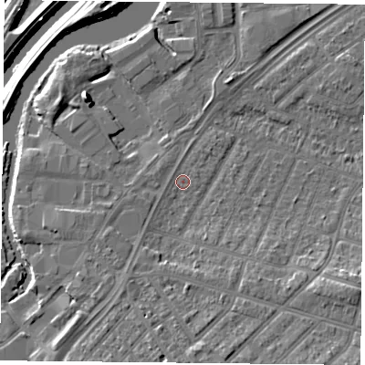 Shaded relief map of the ground around DN24LY, computed from Environment Agency LiDAR. The ground here sits at about 11 m above sea level and falls 14 m across the surrounding 800 m. Surface water reaching this point runs off ground lying to the south-east, 6.6 m higher.