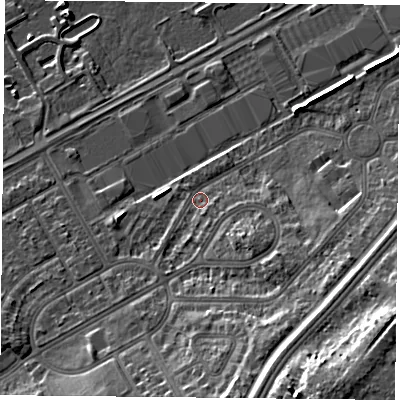 Shaded relief map of the ground around DN24QD, computed from Environment Agency LiDAR. The ground here sits at about 11 m above sea level and falls 15 m across the surrounding 800 m. Surface water reaching this point runs off ground lying to the south-south-east, 9.7 m higher.