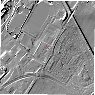 Shaded relief map of the ground around DN24RG, computed from Environment Agency LiDAR. The ground here sits at about 10 m above sea level and falls 11 m across the surrounding 800 m. Surface water reaching this point runs off ground lying to the south, 1.9 m higher.