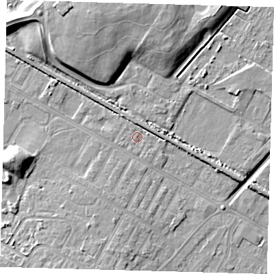 Shaded relief map of the ground around DN312BP, computed from Environment Agency LiDAR. The ground here sits at about 4 m above sea level and falls 14 m across the surrounding 800 m. Surface water reaching this point runs off ground lying to the south-west, 2.1 m higher.