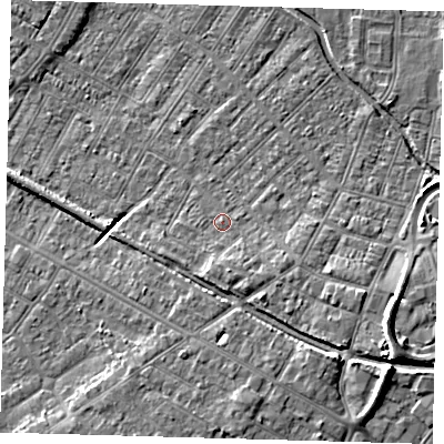 Shaded relief map of the ground around DN312DS, computed from Environment Agency LiDAR. The ground here sits at about 4 m above sea level and falls 10 m across the surrounding 800 m. Surface water reaching this point runs off ground lying to the south, 2.5 m higher.