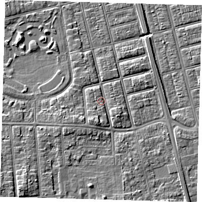 Shaded relief map of the ground around DN320LB, computed from Environment Agency LiDAR. The ground here sits at about 4 m above sea level and falls 7 m across the surrounding 800 m. Surface water reaching this point runs off ground lying to the south, 2.9 m higher.