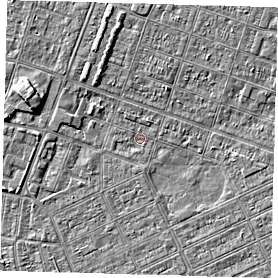 Shaded relief map of the ground around DN328AP, computed from Environment Agency LiDAR. The ground here sits at about 2 m above sea level and falls 5 m across the surrounding 800 m. Surface water reaching this point runs off ground lying to the north, 0.7 m higher.