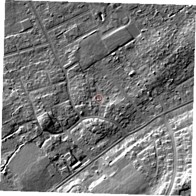 Shaded relief map of the ground around DN328LT, computed from Environment Agency LiDAR. The ground here sits at about 4 m above sea level and falls 12 m across the surrounding 800 m. Surface water reaching this point runs off ground lying to the east-north-east, 2.9 m higher.