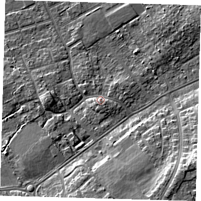 Shaded relief map of the ground around DN328LX, computed from Environment Agency LiDAR. The ground here sits at about 5 m above sea level and falls 11 m across the surrounding 800 m. Surface water reaching this point runs off ground lying to the south-east, 2.1 m higher.