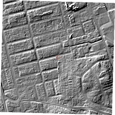 Shaded relief map of the ground around DN329QL, computed from Environment Agency LiDAR. The ground here sits at about 4 m above sea level and falls 7 m across the surrounding 800 m. Surface water reaching this point runs off ground lying to the south-south-east, 3.7 m higher.