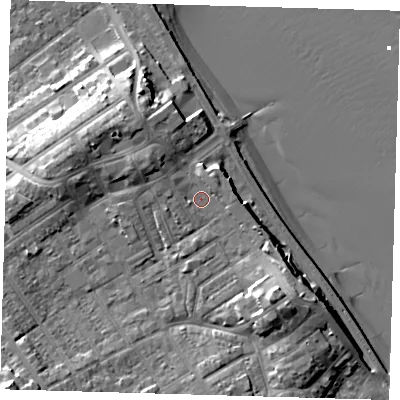 Shaded relief map of the ground around DN358LE, computed from Environment Agency LiDAR. The ground here sits at about 9 m above sea level and falls 16 m across the surrounding 800 m. Surface water reaching this point runs off ground lying to the south-east, 6.6 m higher.