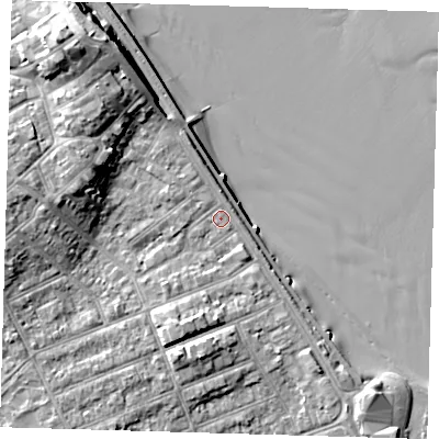 Shaded relief map of the ground around DN358QL, computed from Environment Agency LiDAR. The ground here sits at about 7 m above sea level and falls 14 m across the surrounding 800 m. Surface water reaching this point runs off ground lying to the north-west, 9.4 m higher.