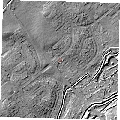 Shaded relief map of the ground around DN379HF, computed from Environment Agency LiDAR. The ground here sits at about 4 m above sea level and falls 11 m across the surrounding 800 m. Surface water reaching this point runs off ground lying to the north-west, 5.8 m higher.