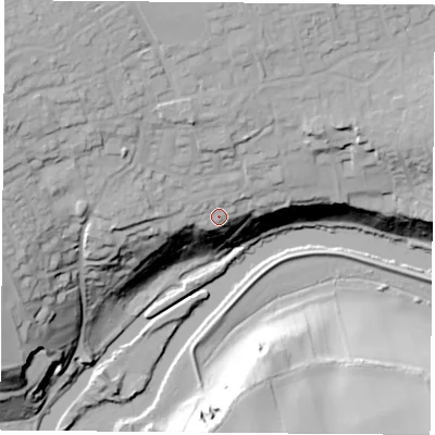 Shaded relief map of the ground around DN57DX, computed from Environment Agency LiDAR. The ground here sits at about 33 m above sea level and falls 43 m across the surrounding 800 m. Surface water reaching this point runs off ground lying to the north-west, 4.9 m higher.
