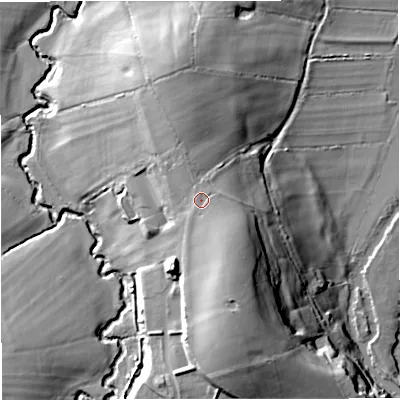 Shaded relief map of the ground around DT102JQ, computed from Environment Agency LiDAR. The ground here sits at about 65 m above sea level and falls 26 m across the surrounding 800 m. Surface water reaching this point runs off ground lying to the south-east, 2.0 m higher.
