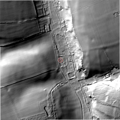 Shaded relief map of the ground around DT110NX, computed from Environment Agency LiDAR. The ground here sits at about 87 m above sea level and falls 45 m across the surrounding 800 m. Surface water reaching this point runs off ground lying to the west-south-west, 22.9 m higher.