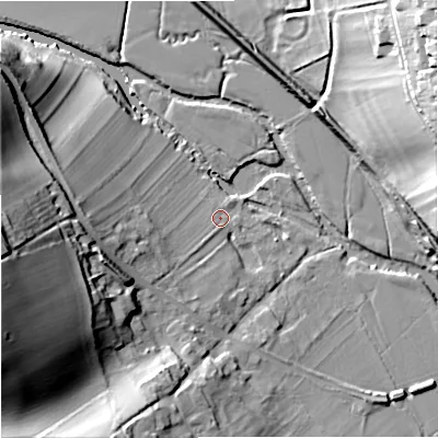 Shaded relief map of the ground around DT110QD, computed from Environment Agency LiDAR. The ground here sits at about 38 m above sea level and falls 40 m across the surrounding 800 m. Surface water reaching this point runs off ground lying to the west-south-west, 36.3 m higher.
