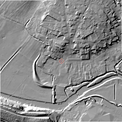Shaded relief map of the ground around DT117AJ, computed from Environment Agency LiDAR. The ground here sits at about 34 m above sea level and falls 32 m across the surrounding 800 m. Surface water reaching this point runs off ground lying to the north, 7.4 m higher.