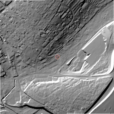 Shaded relief map of the ground around DT117RZ, computed from Environment Agency LiDAR. The ground here sits at about 35 m above sea level and falls 40 m across the surrounding 800 m. Surface water reaching this point runs off ground lying to the north-north-west, 19.5 m higher.