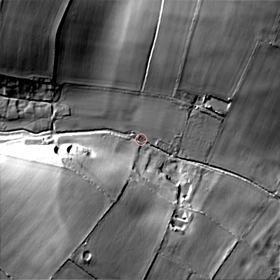 Shaded relief map of the ground around DT118DH, computed from Environment Agency LiDAR. The ground here sits at about 69 m above sea level and falls 30 m across the surrounding 800 m. Surface water reaching this point runs off ground lying to the south-west, 27.5 m higher.