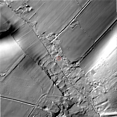 Shaded relief map of the ground around DT118JN, computed from Environment Agency LiDAR. The ground here sits at about 79 m above sea level and falls 33 m across the surrounding 800 m. Surface water reaching this point runs off ground lying to the west-south-west, 29.0 m higher.