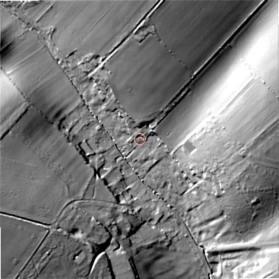 Shaded relief map of the ground around DT118JR, computed from Environment Agency LiDAR. The ground here sits at about 79 m above sea level and falls 31 m across the surrounding 800 m. Surface water reaching this point runs off ground lying to the north, 18.2 m higher.