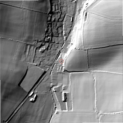 Shaded relief map of the ground around DT118XF, computed from Environment Agency LiDAR. The ground here sits at about 52 m above sea level and falls 37 m across the surrounding 800 m. Surface water reaching this point runs off ground lying to the east, 8.7 m higher.