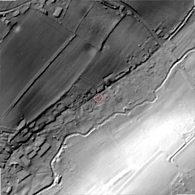 Shaded relief map of the ground around DT119JE, computed from Environment Agency LiDAR. The ground here sits at about 36 m above sea level and falls 45 m across the surrounding 800 m. Surface water reaching this point runs off ground lying to the north-west, 37.0 m higher.