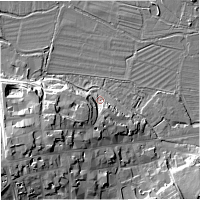 Shaded relief map of the ground around DT11JG, computed from Environment Agency LiDAR. The ground here sits at about 57 m above sea level and falls 25 m across the surrounding 800 m. Surface water reaching this point runs off ground lying to the south-west, 18.8 m higher.