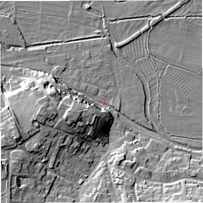 Shaded relief map of the ground around DT11LQ, computed from Environment Agency LiDAR. The ground here sits at about 53 m above sea level and falls 16 m across the surrounding 800 m. Surface water reaching this point runs off ground lying to the west-north-west, 10.1 m higher.