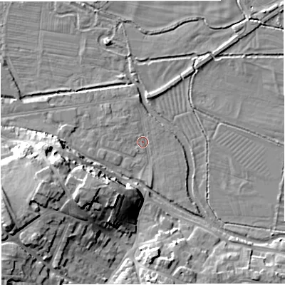 Shaded relief map of the ground around DT11NQ, computed from Environment Agency LiDAR. The ground here sits at about 53 m above sea level and falls 16 m across the surrounding 800 m. Surface water reaching this point runs off ground lying to the north, 1.6 m higher.