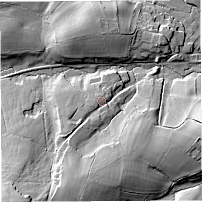 Shaded relief map of the ground around DT20DN, computed from Environment Agency LiDAR. The ground here sits at about 121 m above sea level and falls 43 m across the surrounding 800 m. Surface water reaching this point runs off ground lying to the south-south-west, 24.2 m higher.