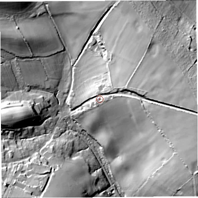 Shaded relief map of the ground around DT20LB, computed from Environment Agency LiDAR. The ground here sits at about 178 m above sea level and falls 51 m across the surrounding 800 m. Surface water reaching this point runs off ground lying to the east, 31.6 m higher.