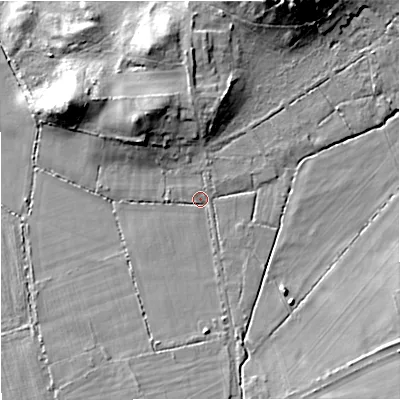 Shaded relief map of the ground around DT28LB, computed from Environment Agency LiDAR. The ground here sits at about 34 m above sea level and falls 20 m across the surrounding 800 m. Surface water reaching this point runs off ground lying to the south, 2.3 m higher.