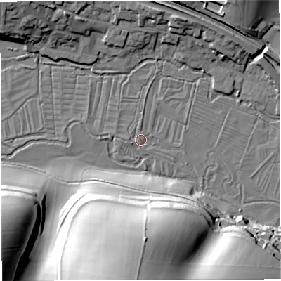 Shaded relief map of the ground around DT29TY, computed from Environment Agency LiDAR. The ground here sits at about 69 m above sea level and falls 52 m across the surrounding 800 m. Surface water reaching this point runs off ground lying to the west-south-west, 1.1 m higher.
