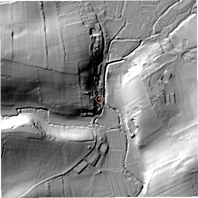 Shaded relief map of the ground around DT34BH, computed from Environment Agency LiDAR. The ground here sits at about 11 m above sea level and falls 33 m across the surrounding 800 m. Surface water reaching this point runs off ground lying to the west-north-west, 29.3 m higher.