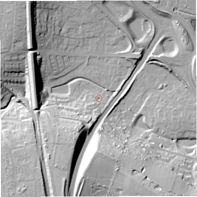 Shaded relief map of the ground around DT35QN, computed from Environment Agency LiDAR. The ground here sits at about 23 m above sea level and falls 42 m across the surrounding 800 m. Surface water reaching this point runs off ground lying to the south-south-east, 38.4 m higher.