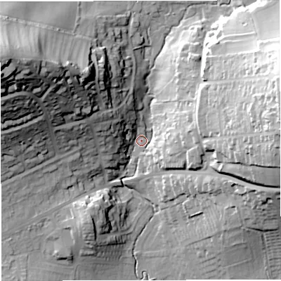 Shaded relief map of the ground around DT36DB, computed from Environment Agency LiDAR. The ground here sits at about 11 m above sea level and falls 58 m across the surrounding 800 m. Surface water reaching this point runs off ground lying to the east-north-east, 44.4 m higher.