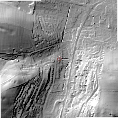 Shaded relief map of the ground around DT36JB, computed from Environment Agency LiDAR. The ground here sits at about 12 m above sea level and falls 44 m across the surrounding 800 m. Surface water reaching this point runs off ground lying to the west-south-west, 4.0 m higher.